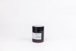 Organics for Lily Matcha Powder is in a black tin and is presented in front of a white background